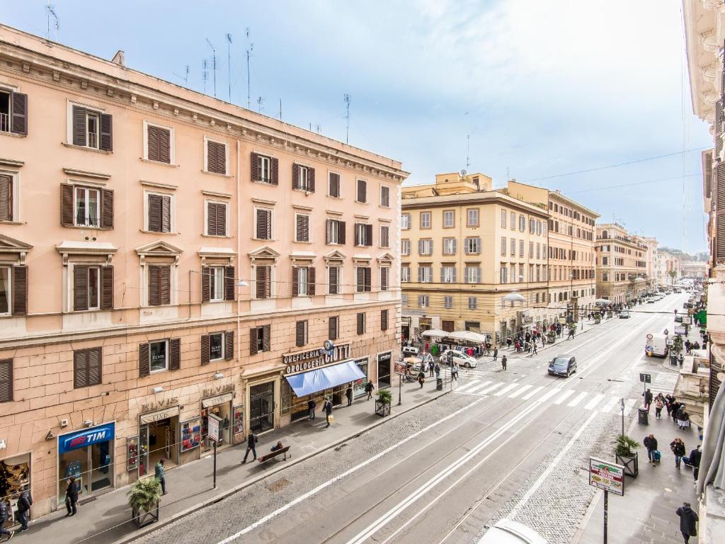 a view of a street in a city with buildings at Vatican City Suites in Rome