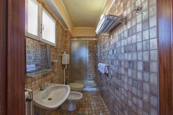 Koupelna v ubytování Hotel Pedrini
