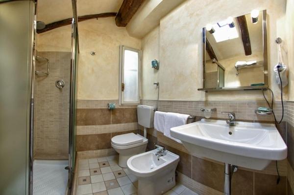 Koupelna v ubytování Hotel Pedrini