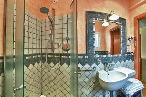 Koupelna v ubytování Hotel Pedrini