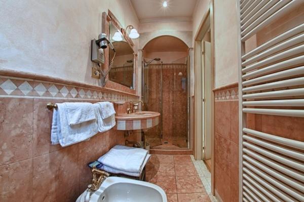 Koupelna v ubytování Hotel Pedrini