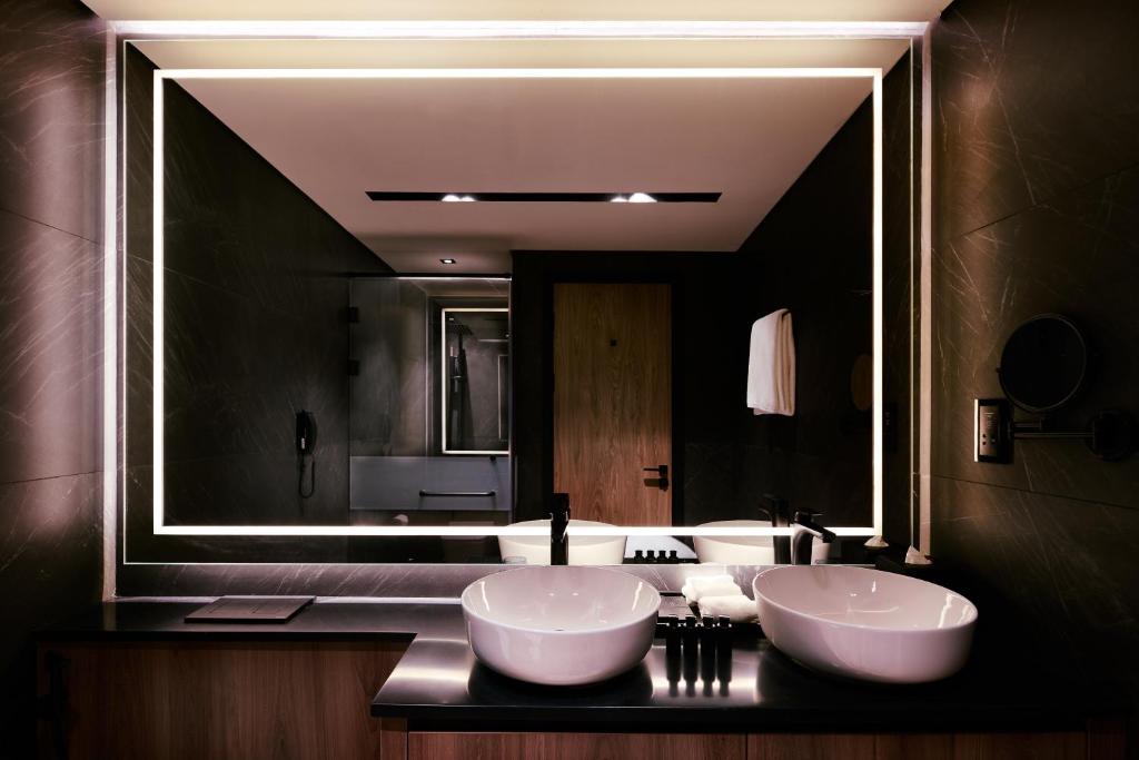 Ein Badezimmer in der Unterkunft The OQ