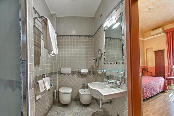 Koupelna v ubytování Hotel Pedrini
