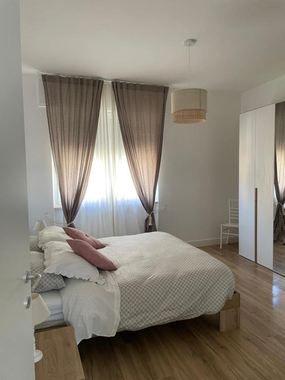 Postel nebo postele na pokoji v ubytování La Casa di Ary