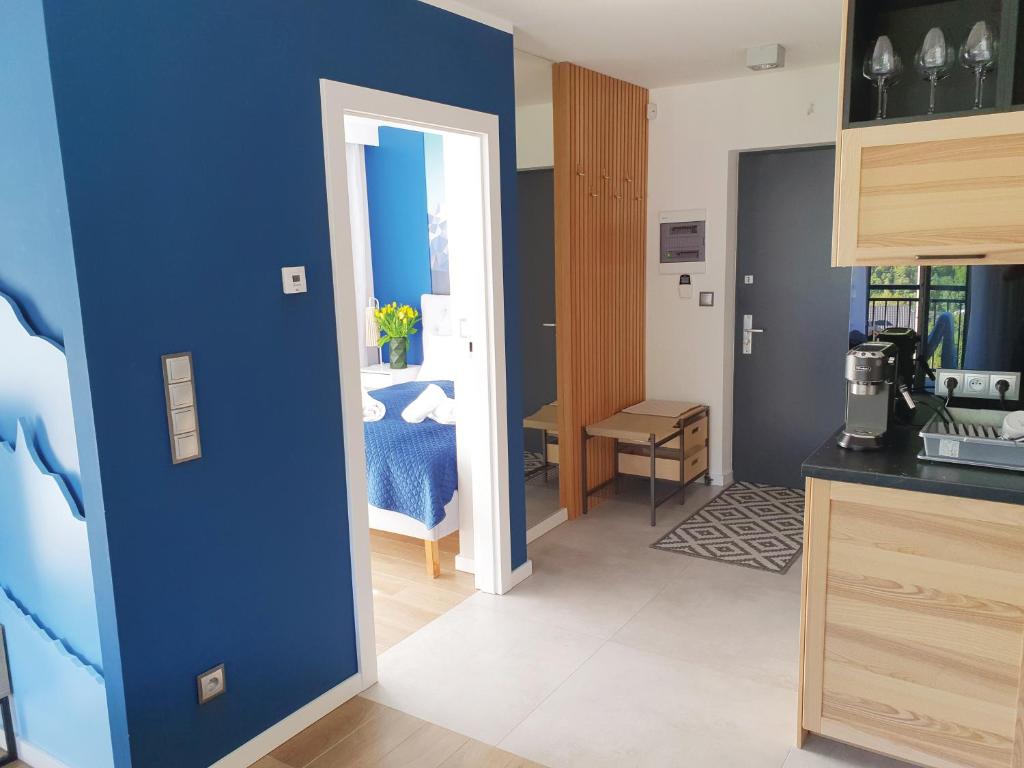 Kuchyňa alebo kuchynka v ubytovaní RelaxApart - Komfortowy apartament z prywatną sauną