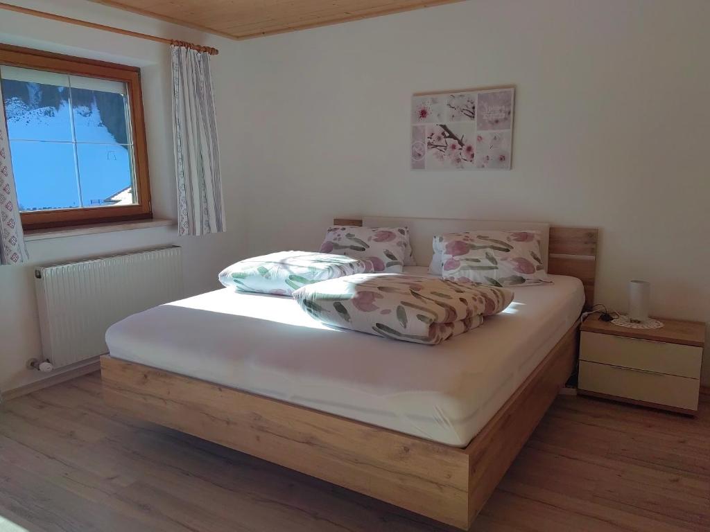 Postel nebo postele na pokoji v ubytování Haus Monika