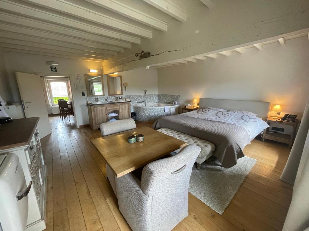 Posezení v ubytování De Verborgen Parel B&B