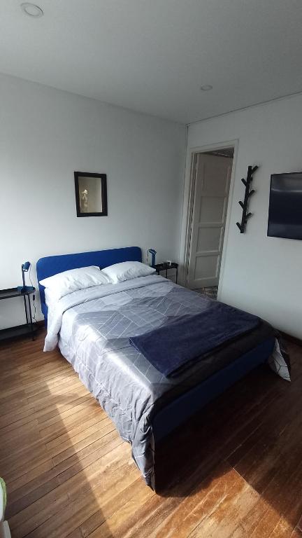 Postel nebo postele na pokoji v ubytování Casa Yolo Bogotá