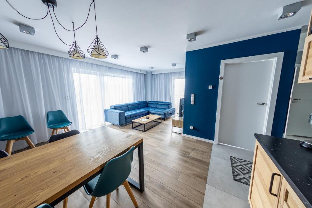 Kuchyňa alebo kuchynka v ubytovaní RelaxApart - Komfortowy apartament z prywatną sauną