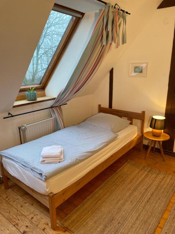 Postel nebo postele na pokoji v ubytování Das Abendrote Haus