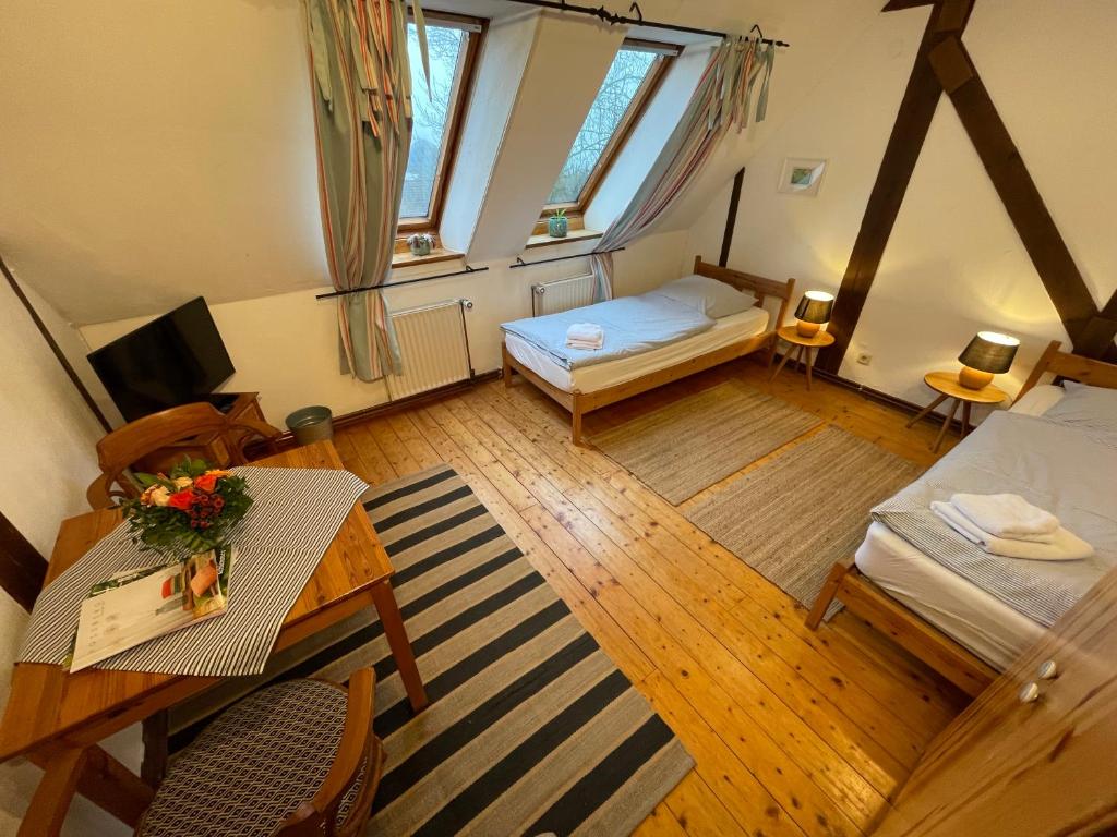 Postel nebo postele na pokoji v ubytování Das Abendrote Haus