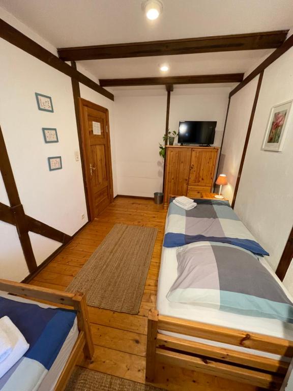 TV a/nebo společenská místnost v ubytování Das Abendrote Haus
