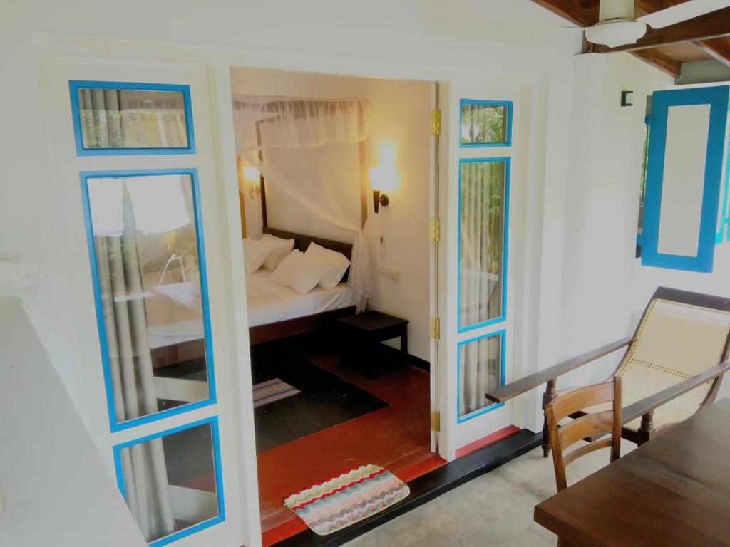Postel nebo postele na pokoji v ubytování White Villa - Homestay