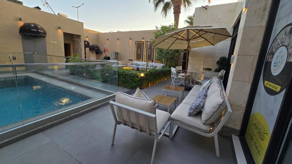 Swimmingpoolen hos eller tæt på lANTANA RESORTS منتجعات لانتانا