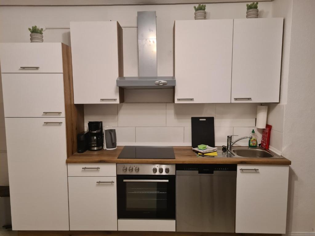 Kuchyň nebo kuchyňský kout v ubytování Seestern Emden