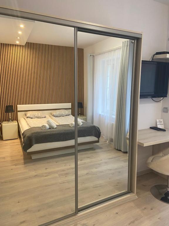 Posteľ alebo postele v izbe v ubytovaní Twój Salon-Apartamenty Stare Miasto