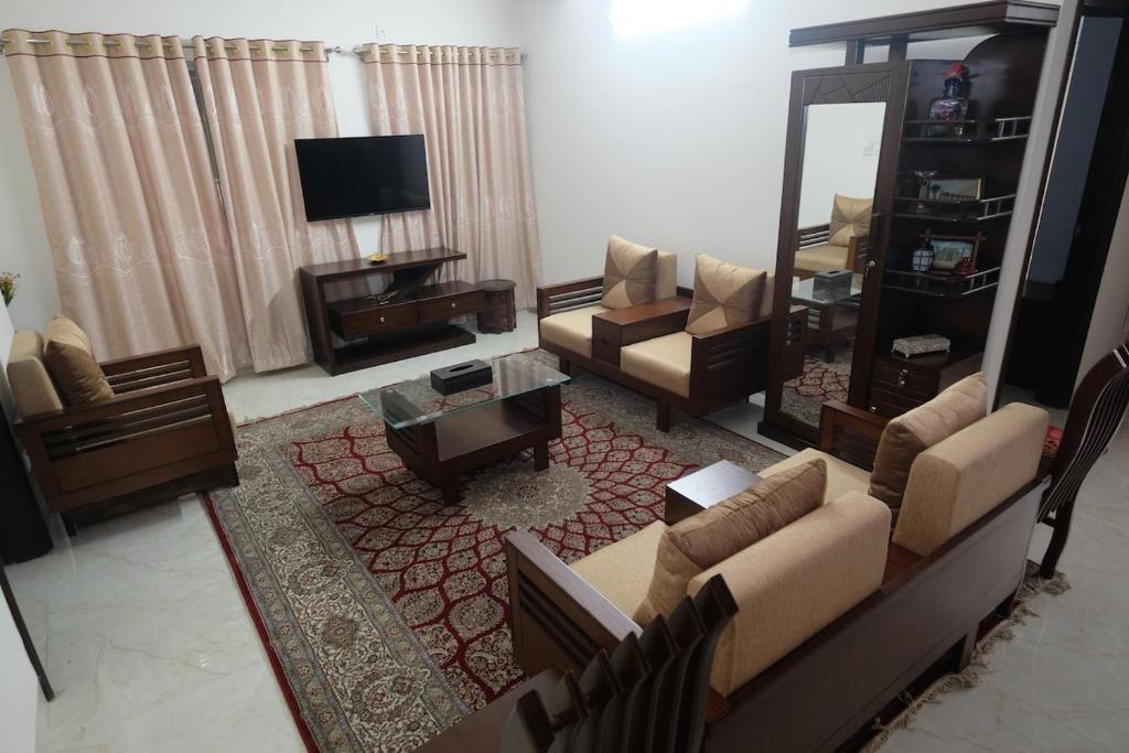 Televisor o centre d'entreteniment de Bashundhara Serenity Suites