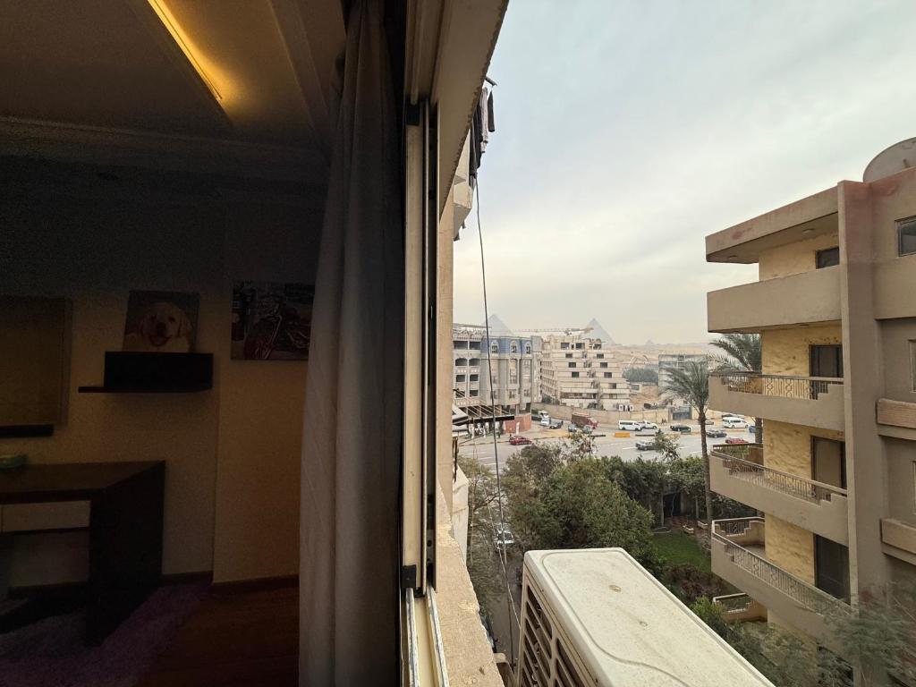 Balkón nebo terasa v ubytování Grand Apartment Pyramids