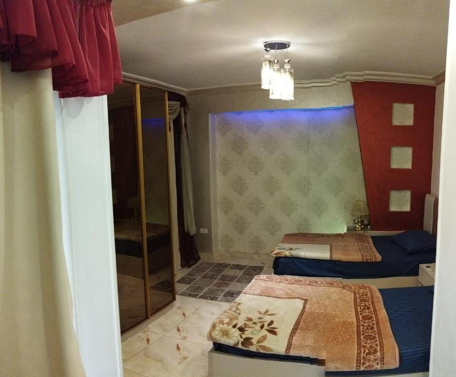 Postel nebo postele na pokoji v ubytování Luxury 3 bedrooms apartment for rent in a sheikh zayed compound
