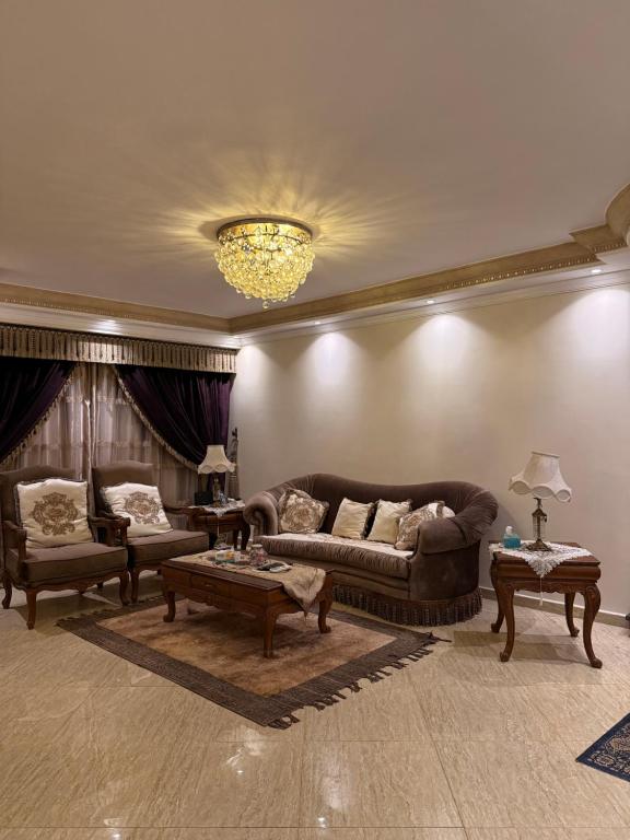 Posezení v ubytování Grand Apartment Pyramids
