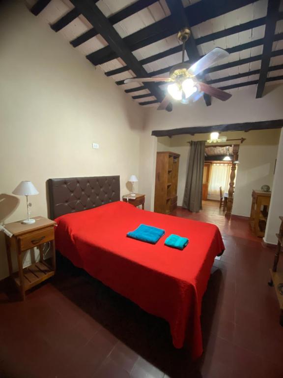 Ένα ή περισσότερα κρεβάτια σε δωμάτιο στο Hospedaje FliaMaria