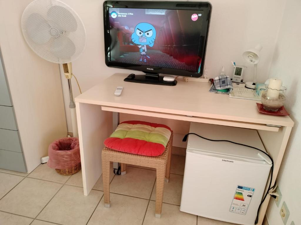 TV a/nebo společenská místnost v ubytování Casa Diana Ticino