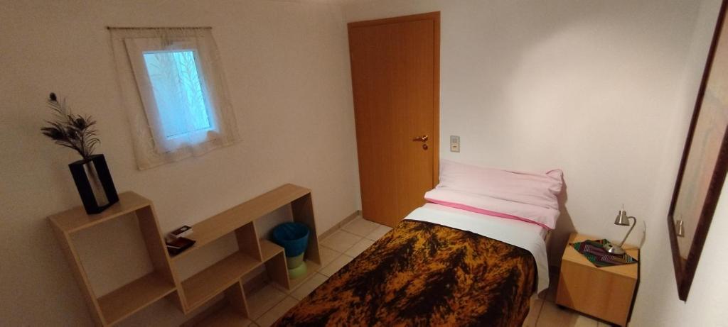 Postel nebo postele na pokoji v ubytování Casa Diana Ticino