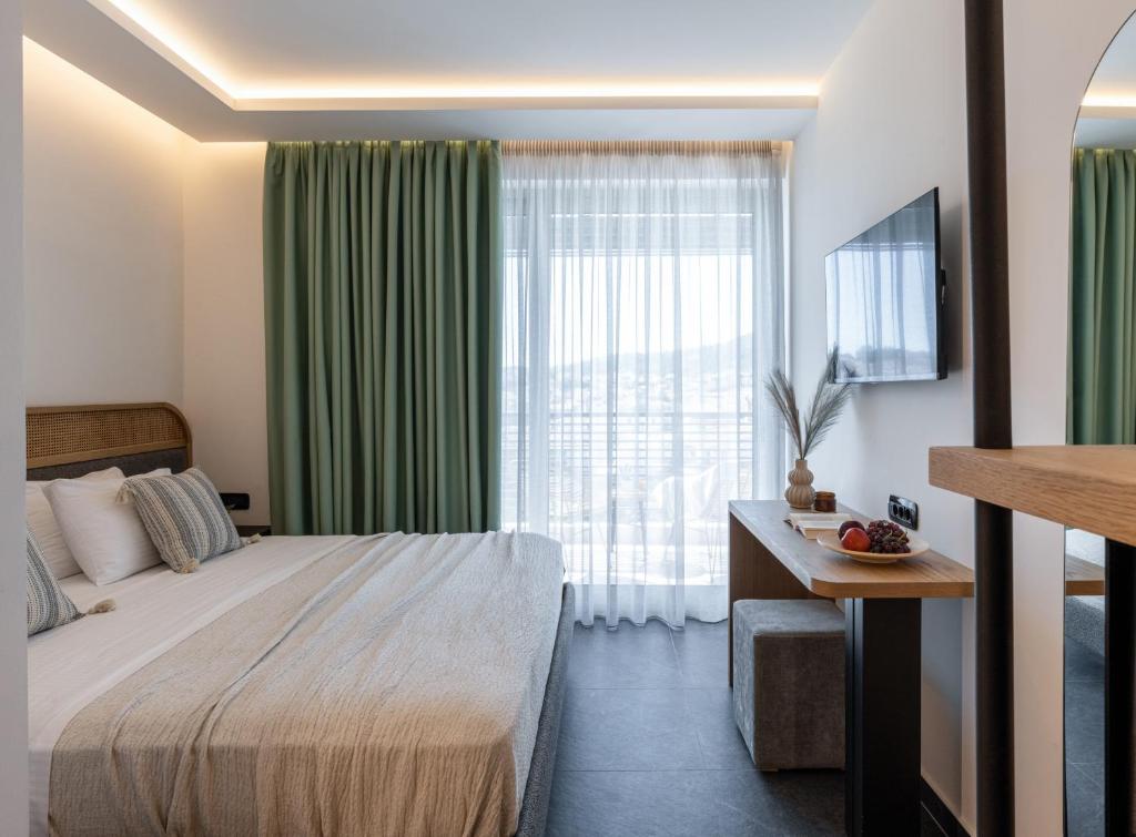 Postel nebo postele na pokoji v ubytování Skia, Premium Key Collection