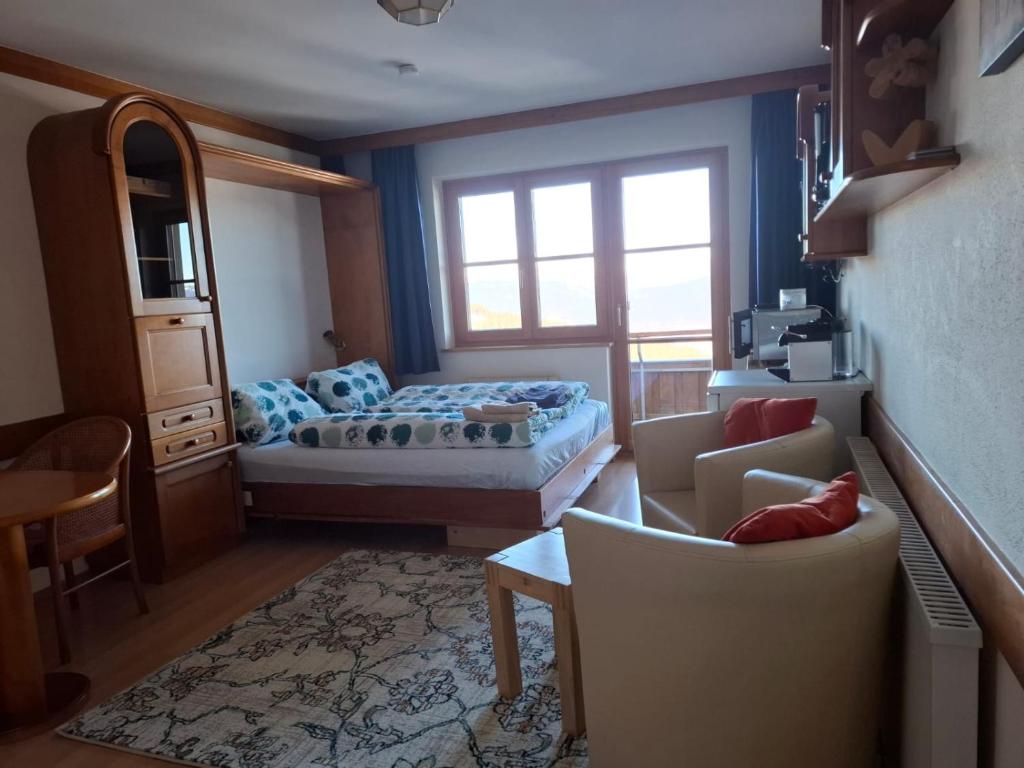 Postel nebo postele na pokoji v ubytování Apartments Susanne und Jasmin - Haus Sonnleitn