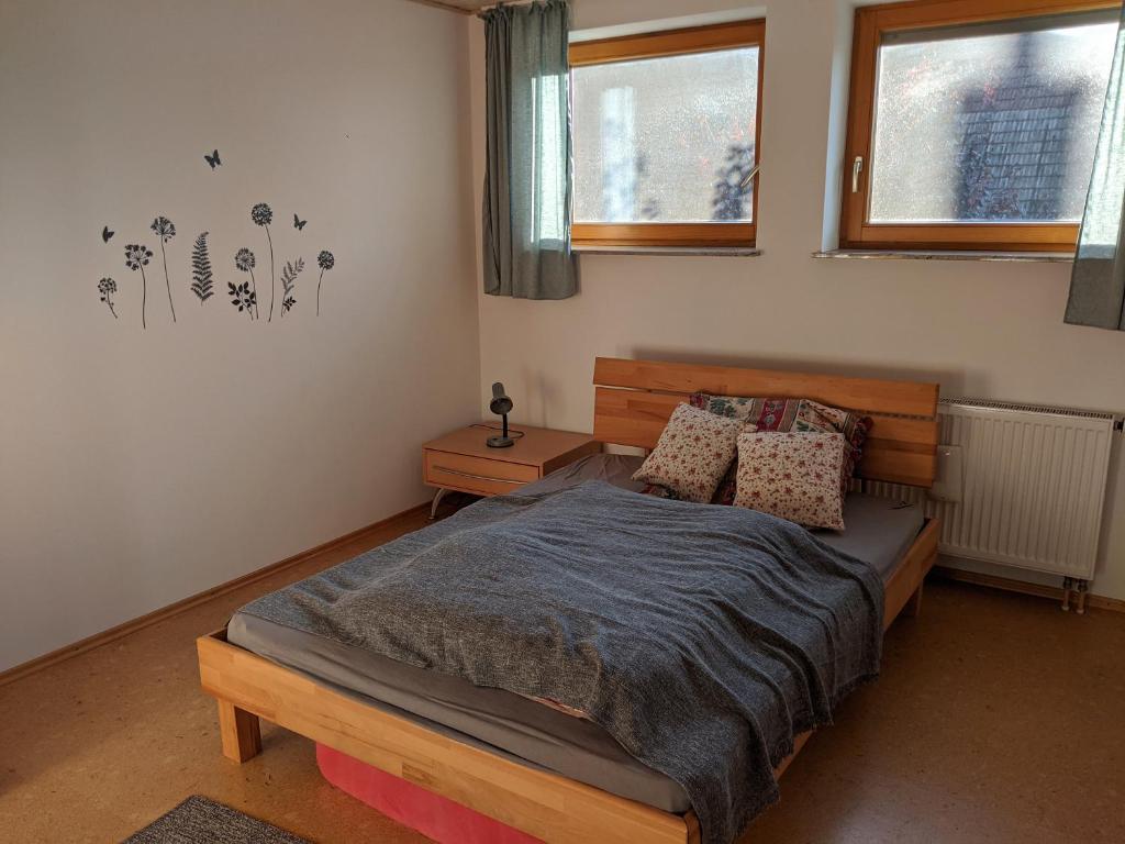 Postel nebo postele na pokoji v ubytování Ferienwohnung Apfelgarten