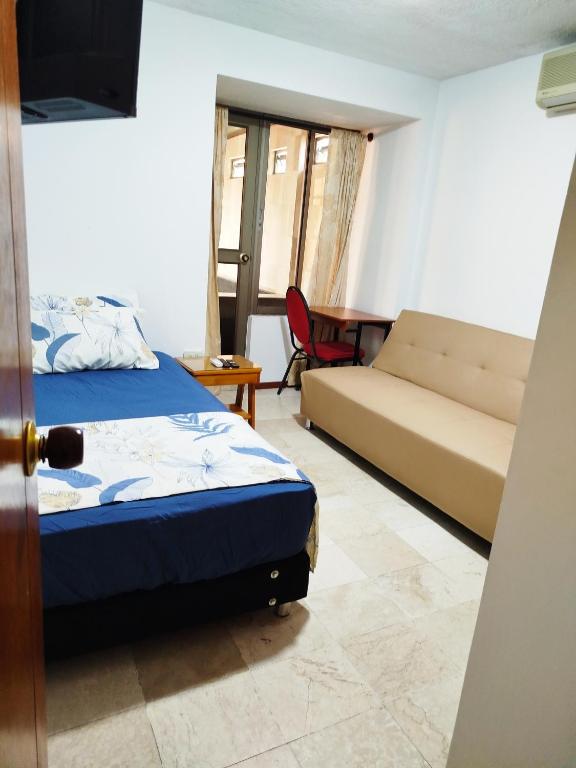 Postel nebo postele na pokoji v ubytování Casa San Joaquin
