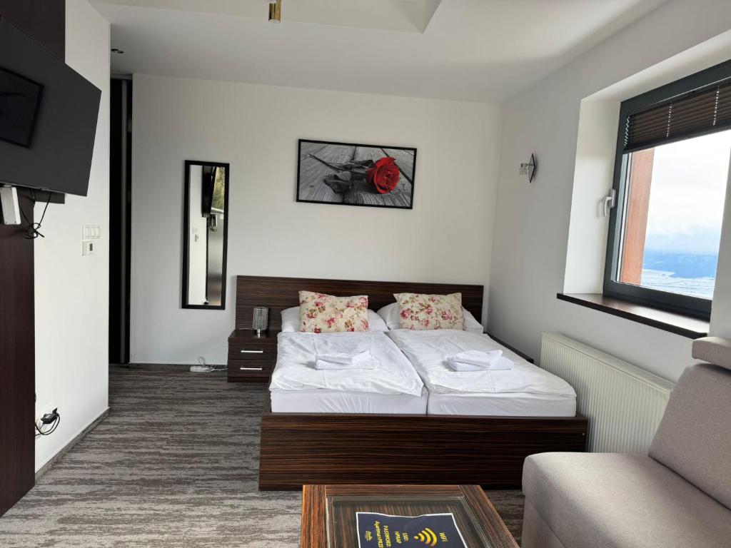 Postel nebo postele na pokoji v ubytování Apartman Panorama 1001