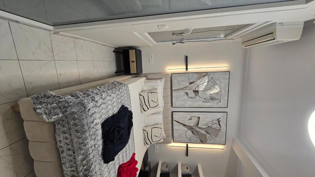 Postel nebo postele na pokoji v ubytování ARPA apartment
