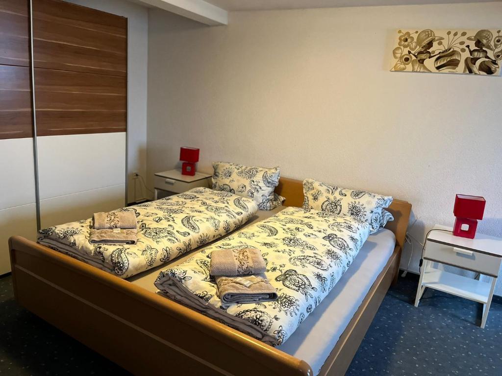Postel nebo postele na pokoji v ubytování Hotel Bären Amriswil