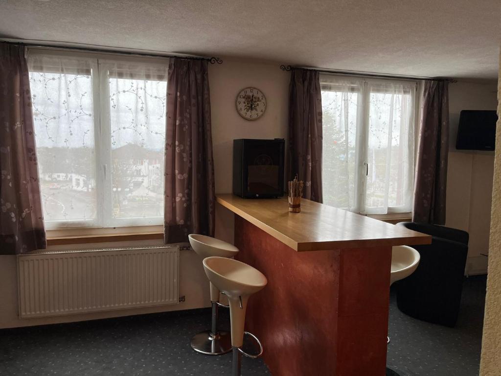TV a/nebo společenská místnost v ubytování Hotel Bären Amriswil