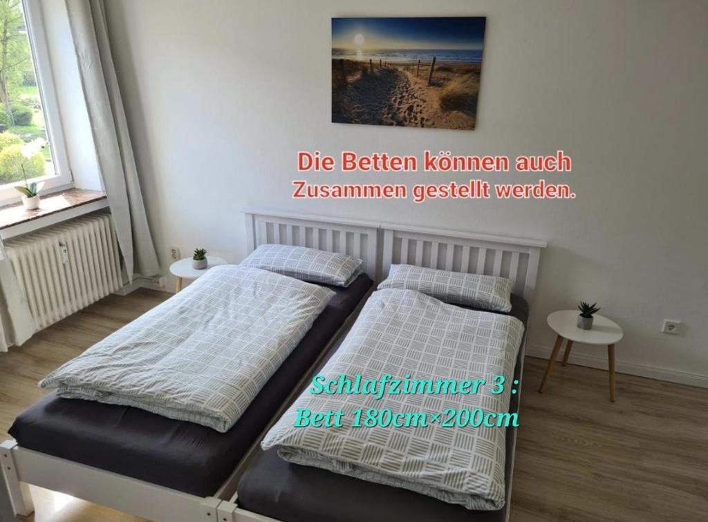 Postel nebo postele na pokoji v ubytování Nordlicht Emden