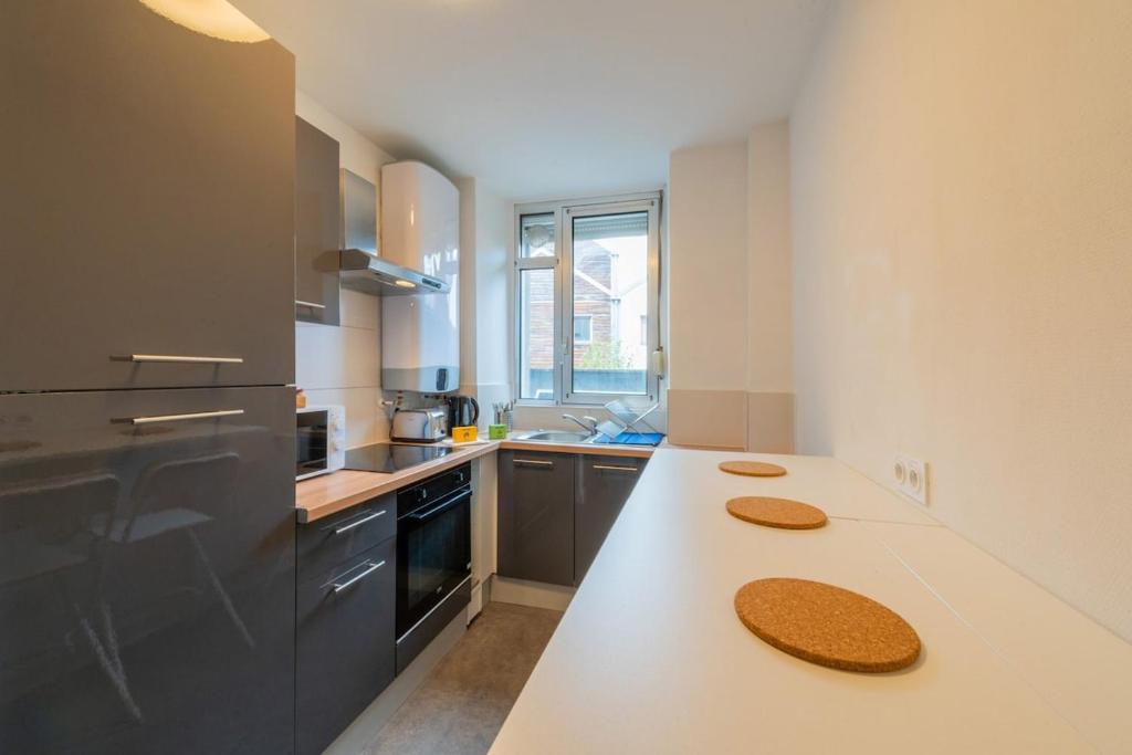 Merles 15 RDC Centre Mulhouse Stationnement – photo 16