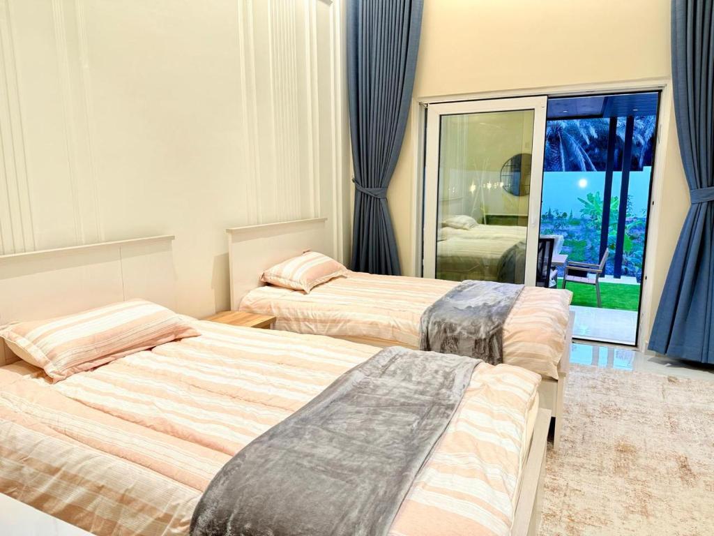 Postel nebo postele na pokoji v ubytování شاليه ميلان Milan Chalet
