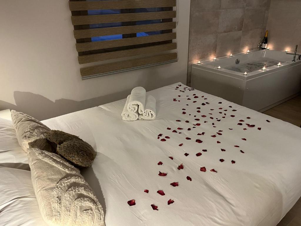 Postel nebo postele na pokoji v ubytování Casas Natura Suites