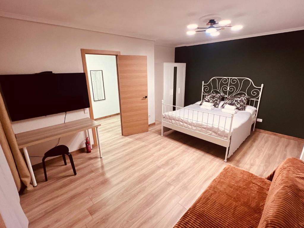 Postel nebo postele na pokoji v ubytování La Familia, Castellon