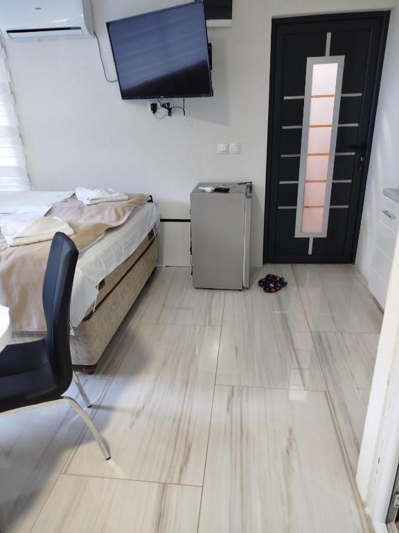 TV a/nebo společenská místnost v ubytování Lela lux
