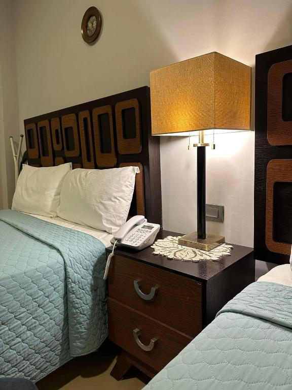 Postel nebo postele na pokoji v ubytování Hotel Boutique Boca - Veracruz