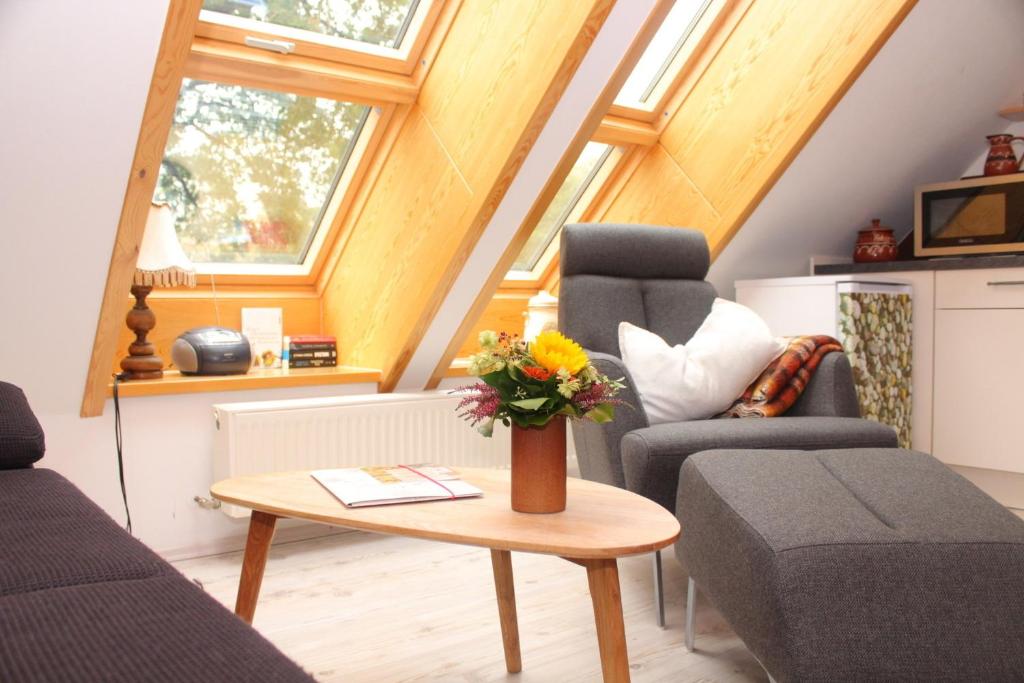 Posezení v ubytování Gästehaus Peerhus Dönsel - Deensten