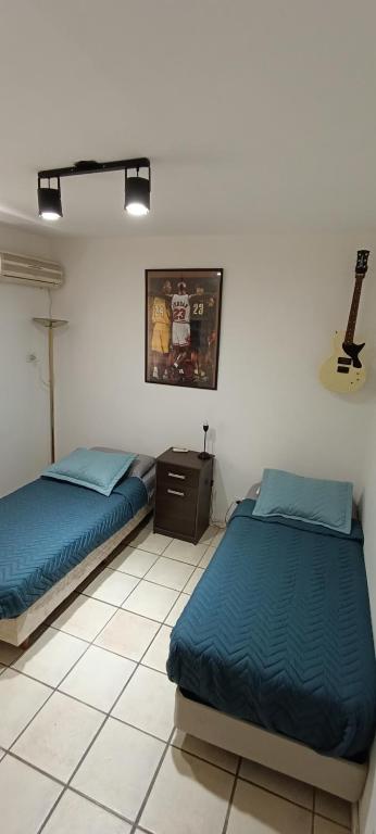 Postel nebo postele na pokoji v ubytování Departamento Alem