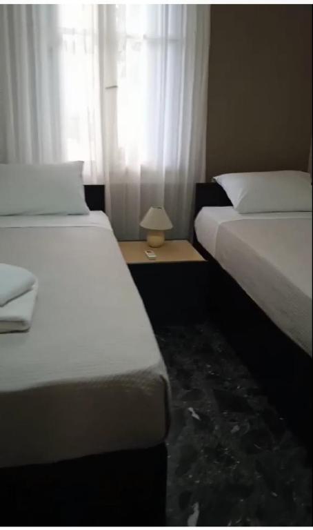 Posteľ alebo postele v izbe v ubytovaní Zacharoula's Home