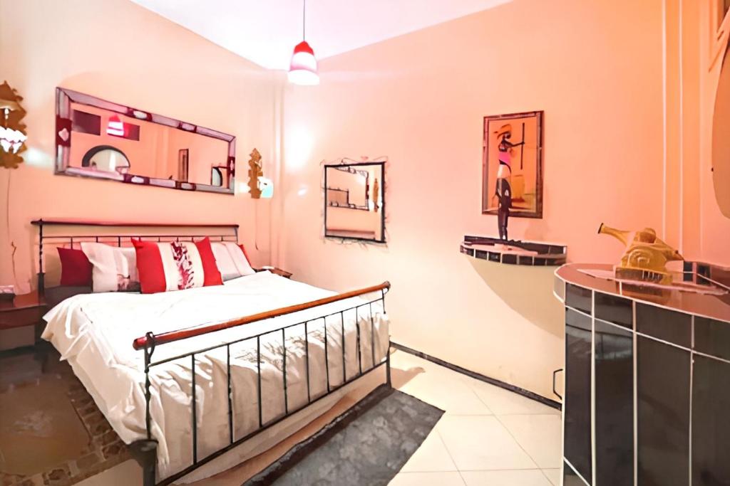 Postel nebo postele na pokoji v ubytování Spacious Apartment in Agadir, 75 sqm with Private Garden