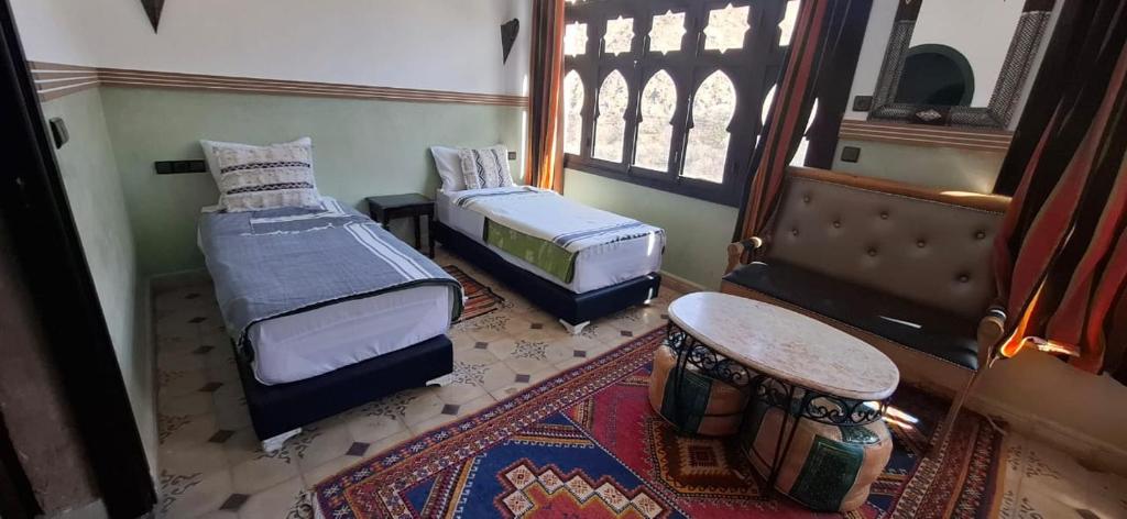 Postel nebo postele na pokoji v ubytování Riad Bab Imlil
