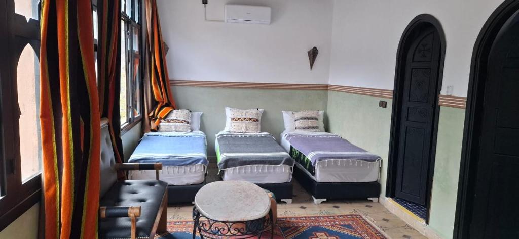 Postel nebo postele na pokoji v ubytování Riad Bab Imlil