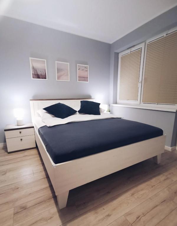 Posteľ alebo postele v izbe v ubytovaní Apartament La Playa