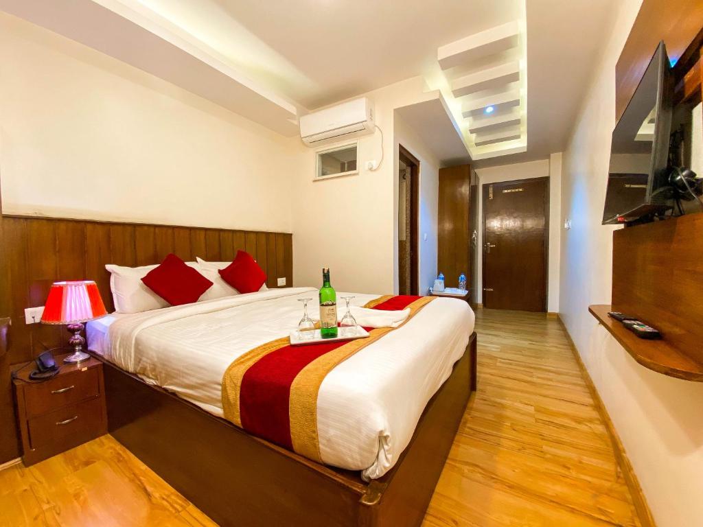 TV a/nebo společenská místnost v ubytování Hotel Abi International